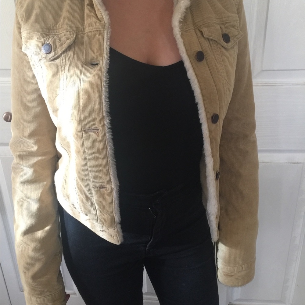 Jacket with fur lining and trim